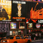 A Virgin Megastore in New York City. System of a Down and Stevie Wonder billboards above. May 2005