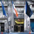 Woman walks in front of the New York Times building in May 2005.