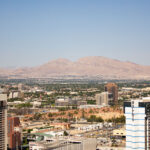 Ballys Hotel and mountains in Las Vegas.