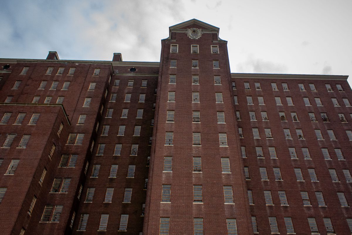 Red brick buildings with barred windows at Kings Park Psychiatric Center in New York.