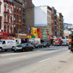Shops on Canal Street in New York City as a UPS truck drops off packages.