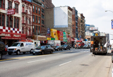 Shops on Canal Street in New York City as a UPS truck drops off packages.