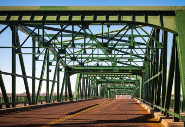 Originally built in 1905 with substantial repairs done over the years, the Lowry Avenue Bridge was closed on April 25, 2008. Controlled explosions demolished it on June 21, 2009.