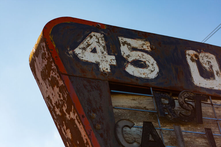 45 Outdoor Theater Sign, New London, Wisconsin 1 The weathered sign for the 45 Outdoor Theater in New London, Wisconsin, a remnant of mid-20th century roadside entertainment, stands as a visual marker of a past era.
