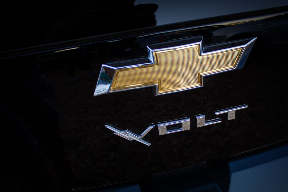 A Chevrolet Volt logo on a car.