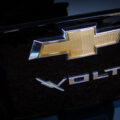 A Chevrolet Volt logo on a car.