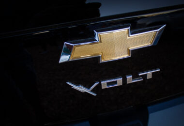 A Chevrolet Volt logo on a car.