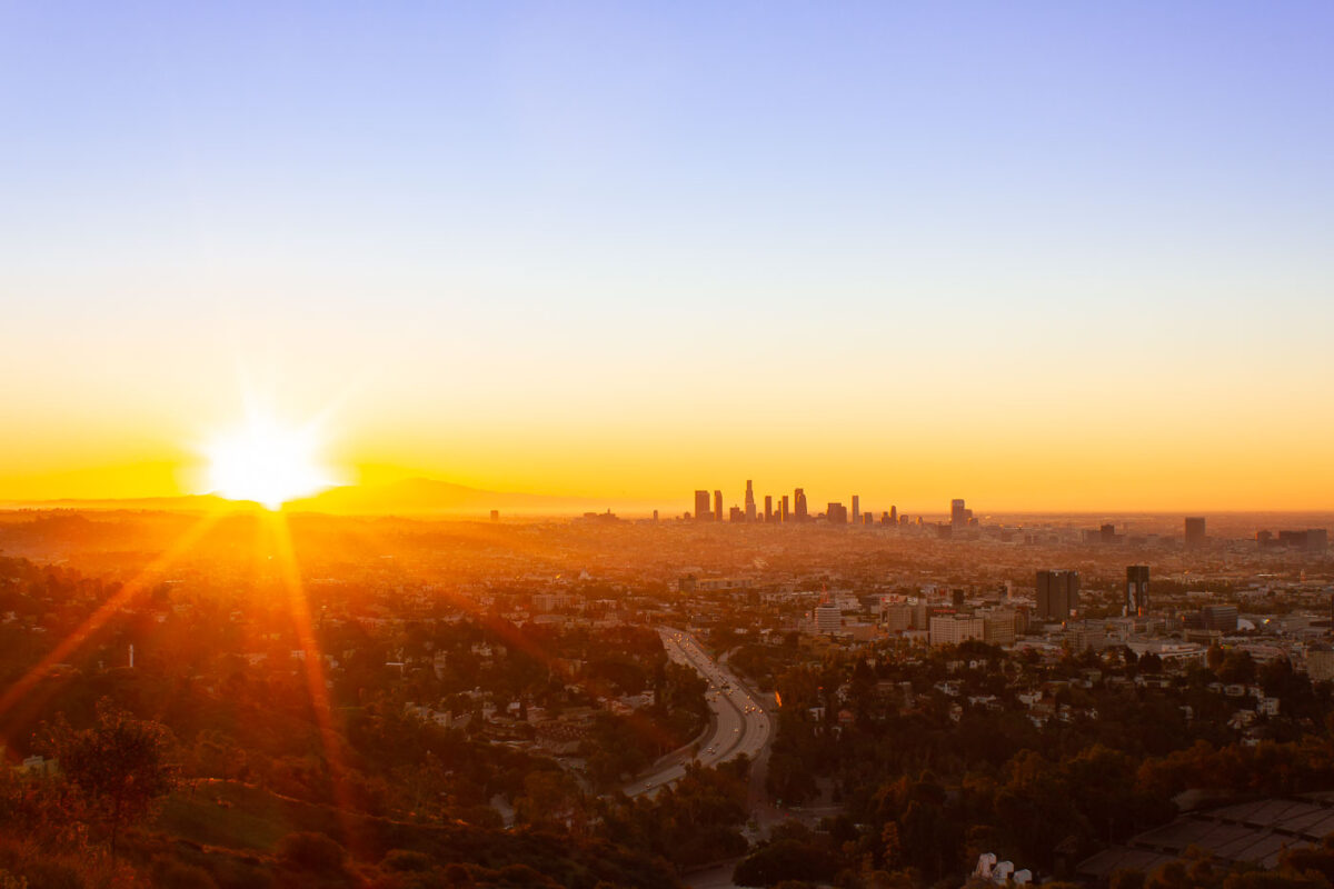 Sunrise behind Los Angeles as seen from Mulholland Drive.