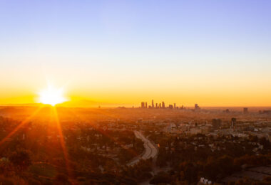 Sunrise behind Los Angeles as seen from Mulholland Drive.