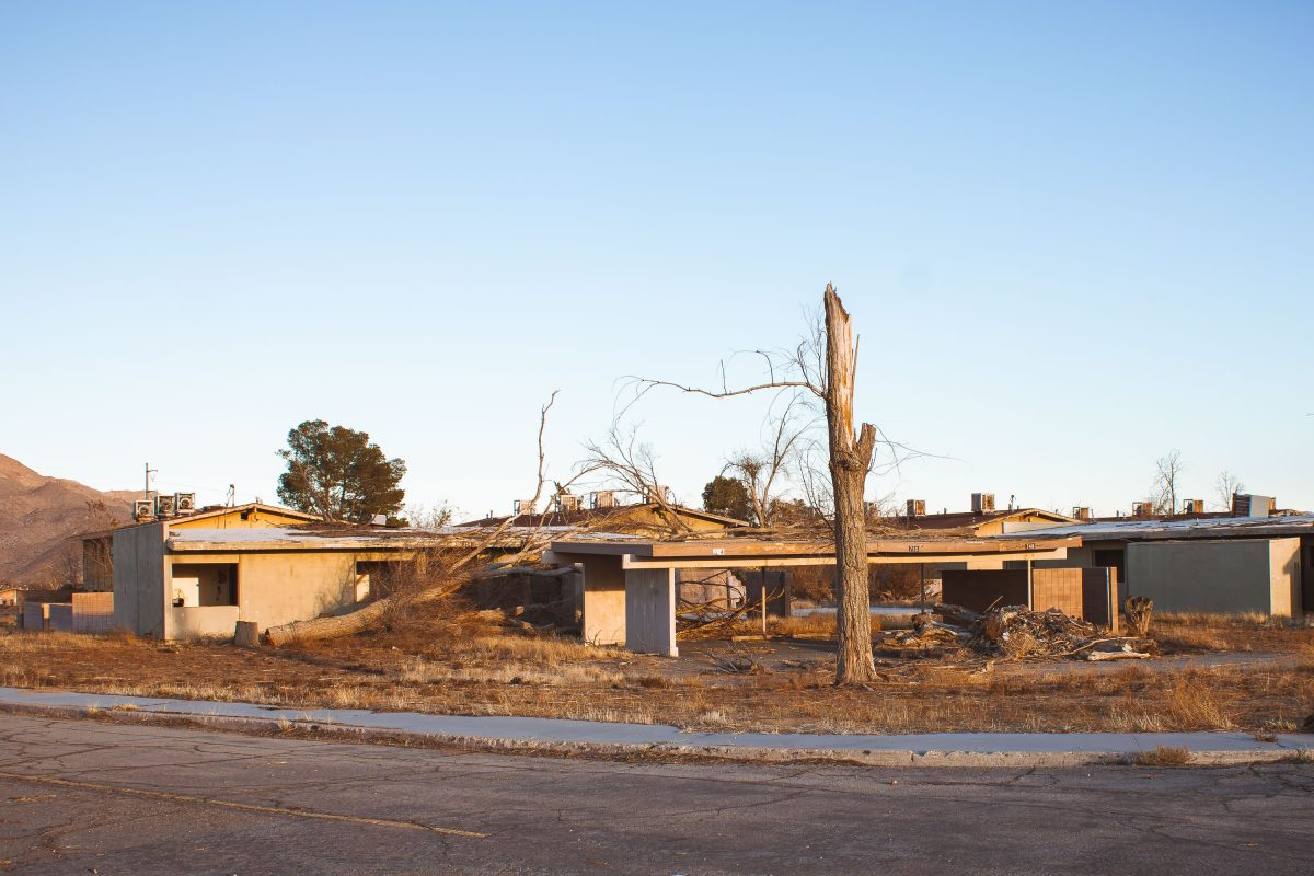 Abandoned residential buildings with bare tree at George Air Force Base in Victorville, California.