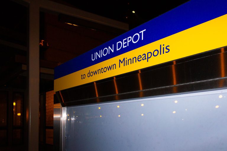 Union Depot Station to Downtown Minneapolis 1 Union Depot in St. Paul points to downtown Minneapolis.