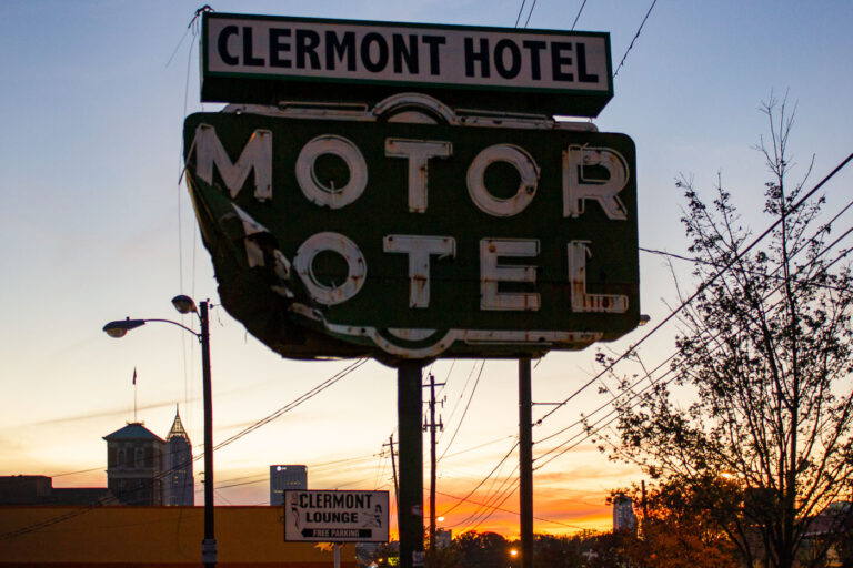 Clermont Hotel Motor Hotel Sign at Sunset, Atlanta, Georgia 3 The Clermont Hotel Motor Hotel neon sign in Atlanta, Georgia, at sunset. The sign advertises the hotel and the adjacent Clermont Lounge.