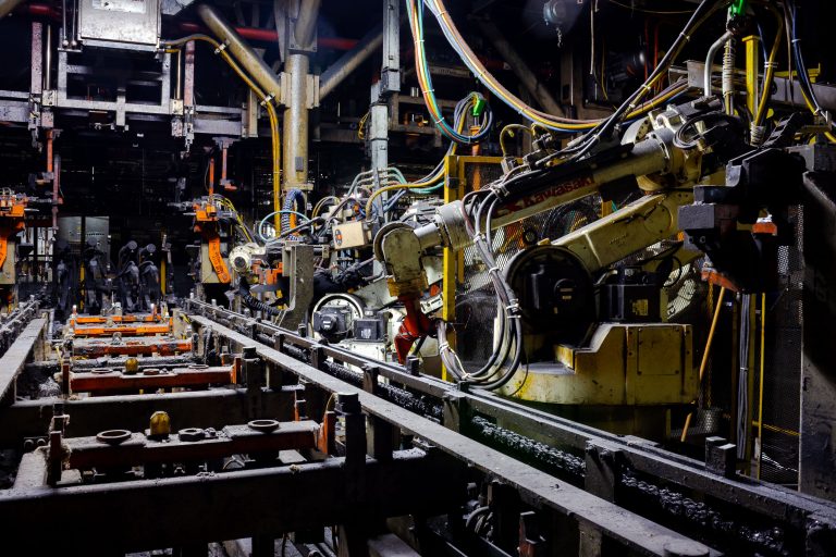 Ford Ranger Assembly Line, Automotive Plant 1 Robotic arms and conveyor systems on the Ford Ranger assembly line at an automotive plant, showcasing automated vehicle manufacturing processes.
