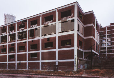Brach's Candy Factory in Chicago before it was demolished. After demolition the land became a semi truck parking lot.