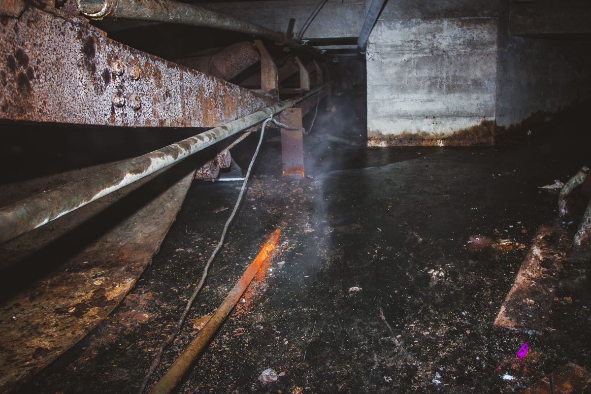 Rusted machinery and debris inside the abandoned Fruen Mill in Minneapolis.