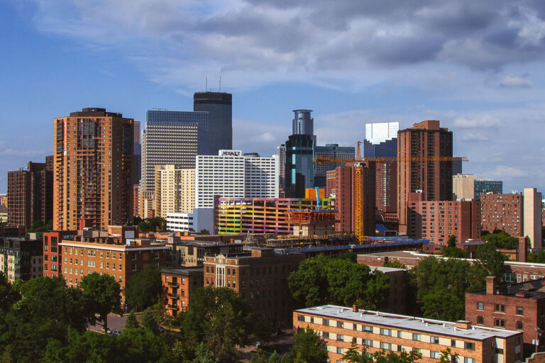 Minneapolis skyline from Loring Park 3 Downtown Minneapolis as seen from Loring Park in June 2013. Crane at the site of the under construction 36-story LPM Apartments building.