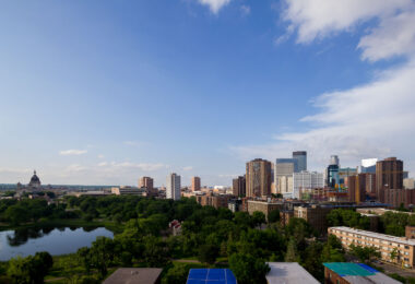 Downtown Minneapolis as seen from Loring Park in 2013. Loring Pond and the Basilica to the left.