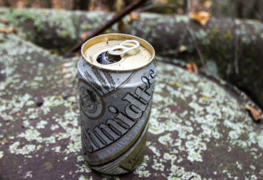 A Schmidt's Beer can found in the woods.