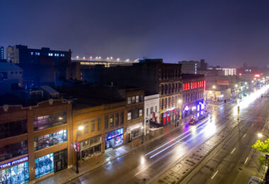 Looking down Washington Avenue in the North Loop in Downtown Minneapolis on a foggy night.