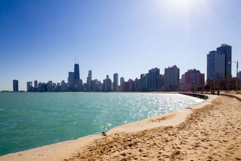 Chicago Skyline and Lake Michigan Shoreline 4 The Chicago skyline rises above the shores of Lake Michigan, a vast freshwater lake that forms the city's eastern boundary. This shoreline is a vital part of Chicago's identity, providing public access to the water and a scenic backdrop to the city's renowned architecture. The development of the lakefront, including parks and beaches, began in the late 19th century and has continued to shape the urban environment. Today, the lakefront serves as a major destination for recreation and offers panoramic views of the city's commercial and residential centers.