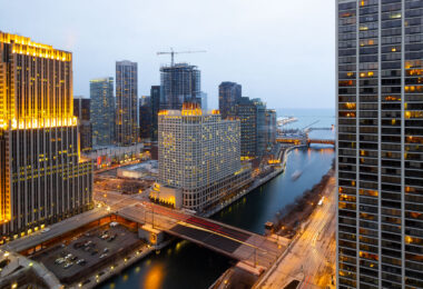 The Chicago River and Wacker Drive in Chicago Illinois. Loews Hotel under construction.