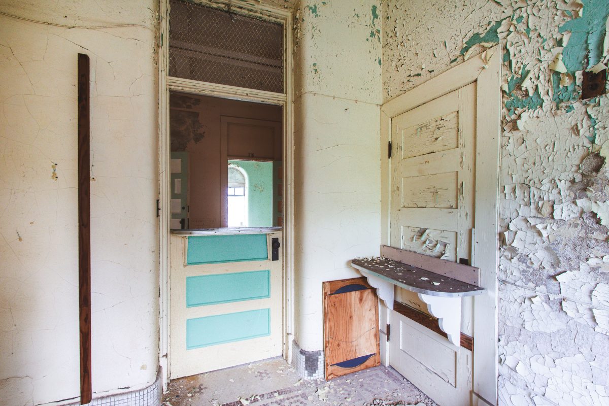Doorway with peeling paint, Fergus Falls Kirkbride Building