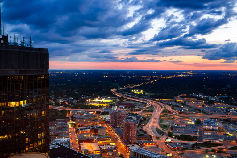 Minneapolis I-394 and I-94 Interchange at Dusk 1 The I-394 and I-94 interchange in Minneapolis, Minnesota, at dusk, showing the freeway system's extensive network connecting the city's core with surrounding areas.