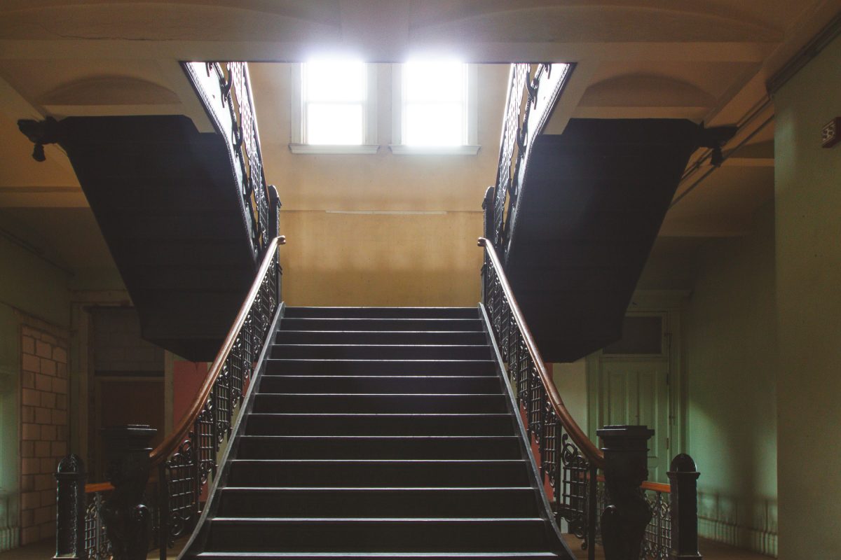Main staircase with iron railings, Fergus Falls Kirkbride Building