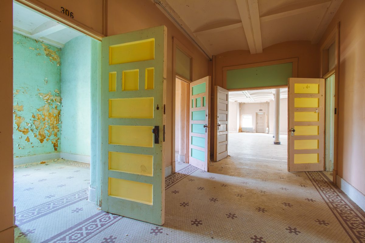 Room 306 doorway with hexagonal tile floor, Fergus Falls Kirkbride Building