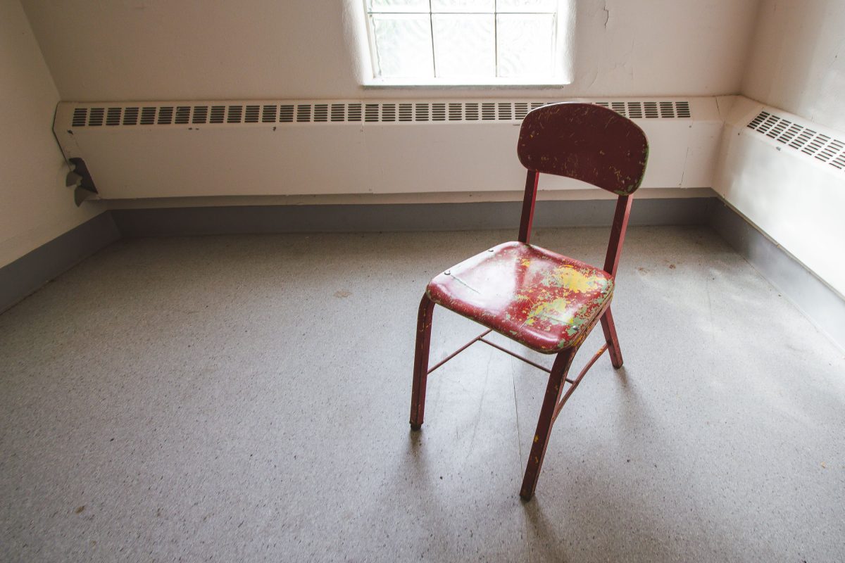 Weathered Chair Beside Radiator, Fergus Falls Kirkbride Building