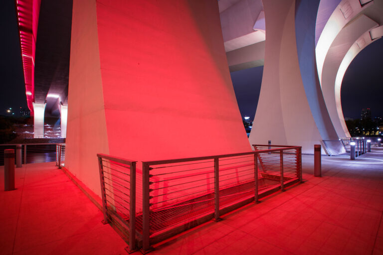 I-35W Bridge Lit Up Red 4 The I-35W bridge in Downtown Minneapolis. The bridge is regularly lit up for different occasions.