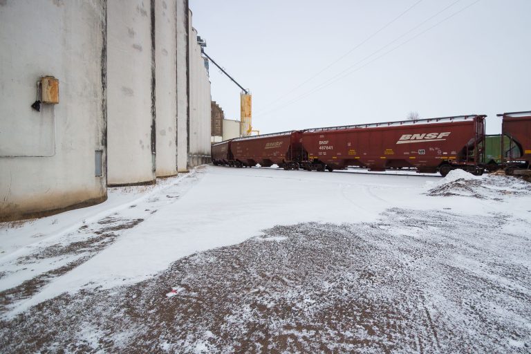 Hansen-Mueller Grain Elevator, Superior, Wisconsin 1 Hansen-Mueller Grain Elevator in Superior, Wisconsin, with BNSF freight cars beside the facility.