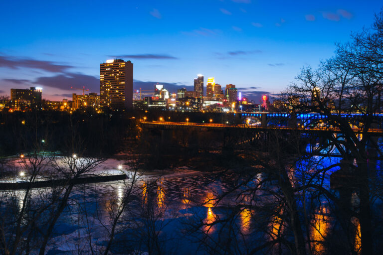 Downtown Minneapolis at blue hour 3 Downtown Minneapolis behind the Mississippi River during blue hour.
