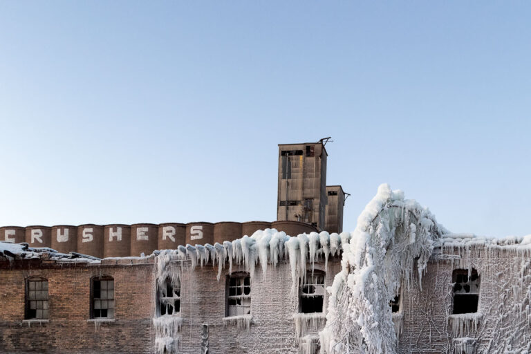 ADM Grain Elevator and Harris Machinery after a fire 4 ADM Grain Elevator and Harris Machinery in the front. Harris Machinery covered in ice after a large fire gutted in the inside. Located in Prospect Park, Minneapolis.