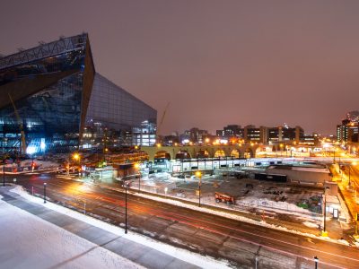 Snowy Night Over US Bank Stadium and Downtown East