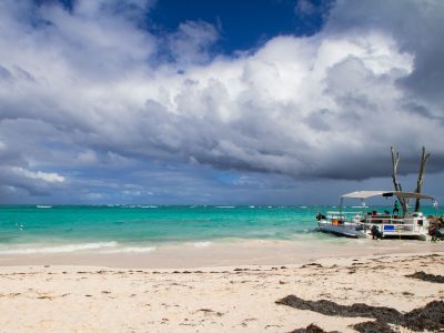 Punta Cana Beach Boat Under Approaching Storm Clouds
