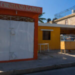 A woman selling bread in La Romana, Dominican Republic