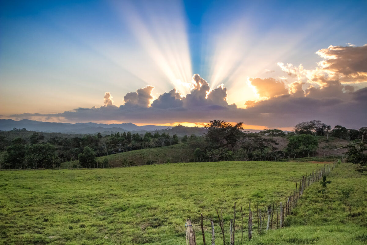 Dominican Republic sunset over farm land