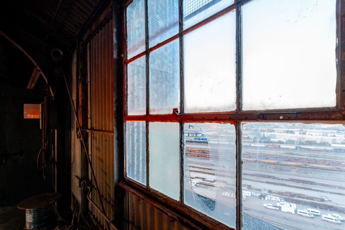 View from inside the abandoned Electric Steel Grain Elevator in Minneapolis looking out over railroad yards.