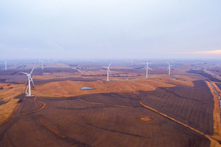 Wind Turbines in Adair, Iowa Farmland 1 Wind turbines generate electricity in a wind farm across the agricultural landscape near Adair, Iowa, a leading state in wind power production.