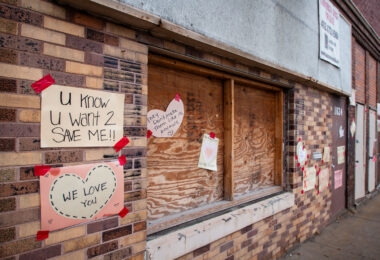 Signs hung on the historic building asking for it to be saved.