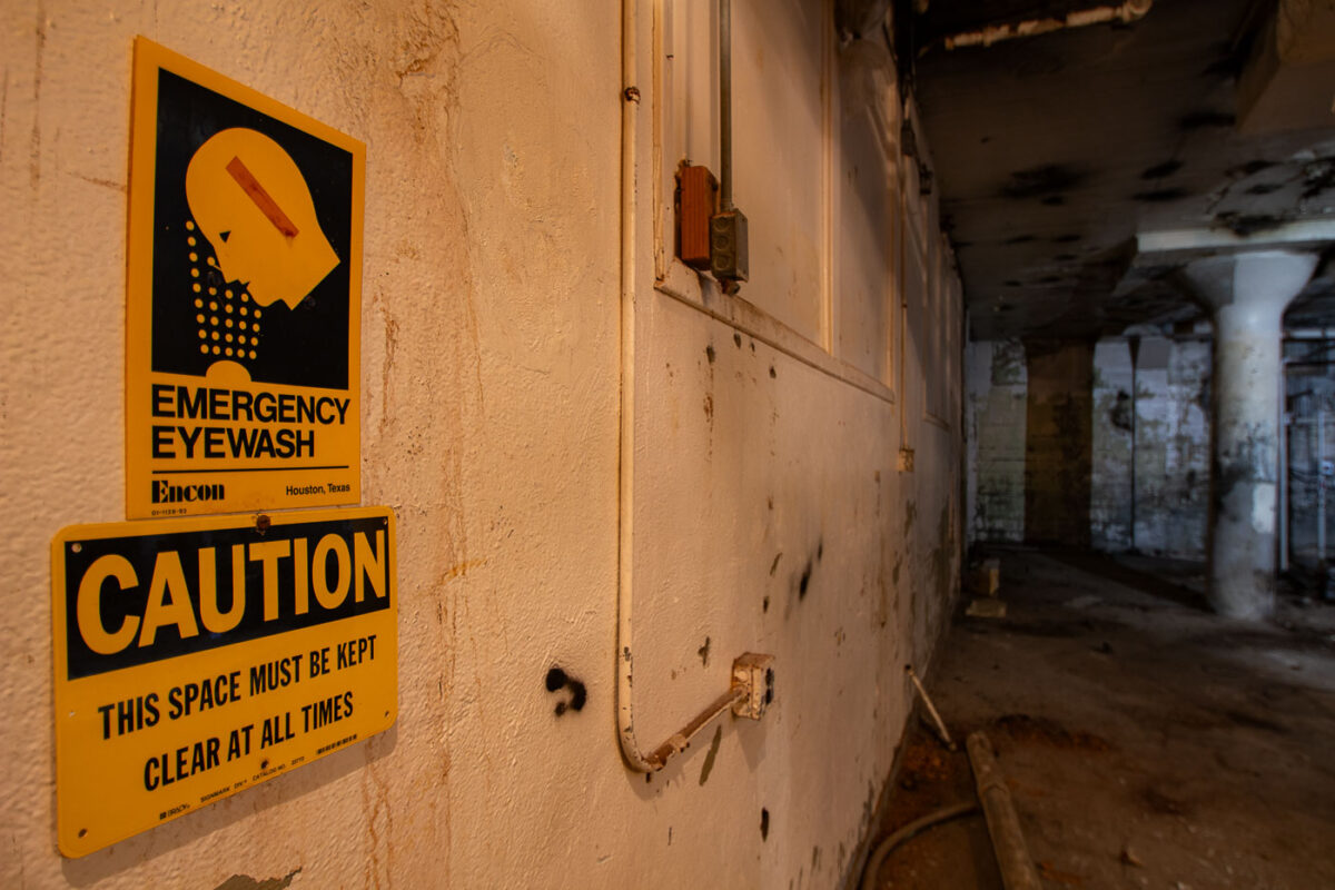 Emergency Eyewash sign found in an abandoned basement.