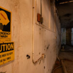 Emergency Eyewash sign found in an abandoned basement.
