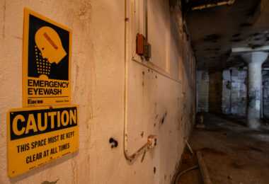 Emergency Eyewash sign found in an abandoned basement.