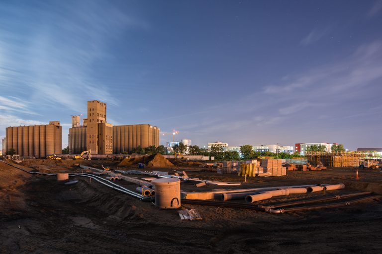 Kurth Malting Site Redevelopment, Dinkytown Minneapolis 3 Construction site at night on the former Kurth Malting grain elevator grounds in Dinkytown, Minneapolis.