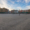 Market Square in Bruges Belgium at sunset.