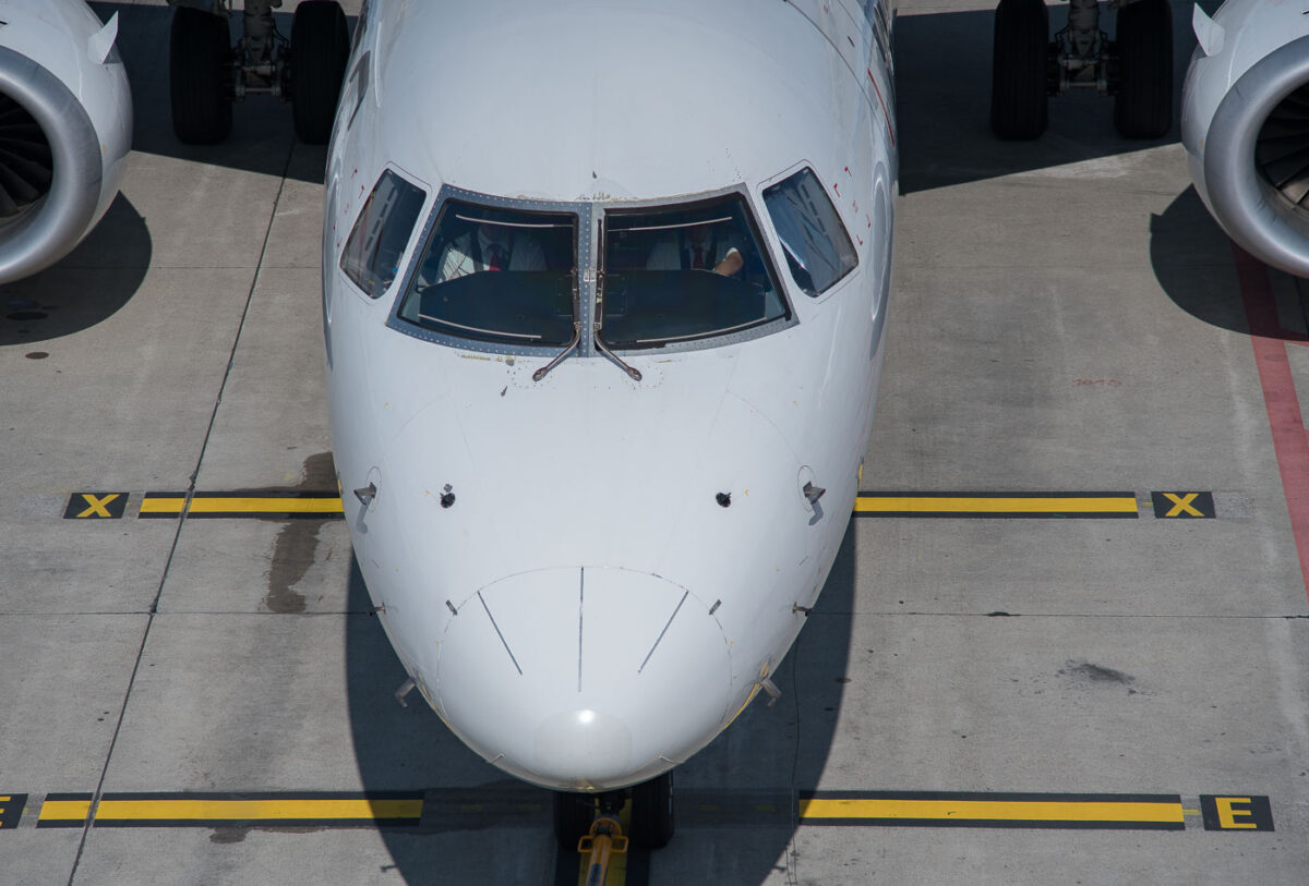 Pilots inside the cockpit awaiting departure at Zurich Airport in Switzerland.