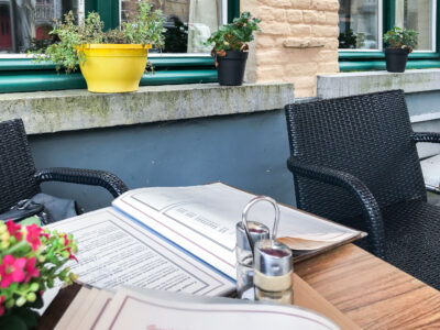 Cafe Table with Menu in Bruges