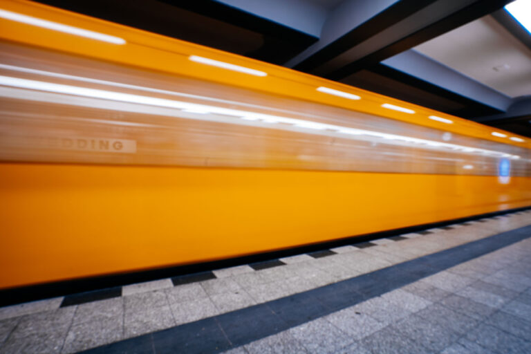 Subway train at the Wedding station in Berlin 2 The U6 line of Berlin’s U-Bahn runs through central neighborhoods including Wedding, one of the city’s oldest working-class districts. The bright orange rolling stock, manufactured by Stadler and others for the BVG network, is a visual hallmark of Berlin’s underground system. Opened in 1923, the Wedding station has seen extensive modernization while retaining its early 20th-century layout. The long exposure emphasizes the U-Bahn’s continuous movement through Berlin’s post-industrial north.