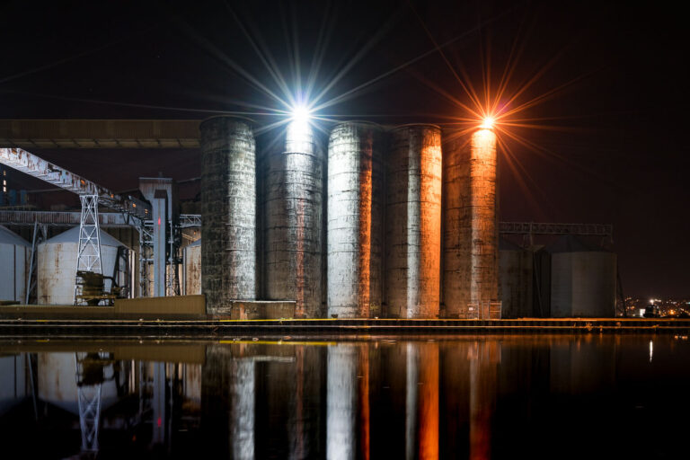 CHS Grain Elevators at Night, Superior, Wisconsin 1 The CHS grain elevators, a key part of Superior, Wisconsin's agricultural trade infrastructure, are illuminated at night along the waterfront.
